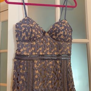 Flirty cocktail dress with spaghetti straps.